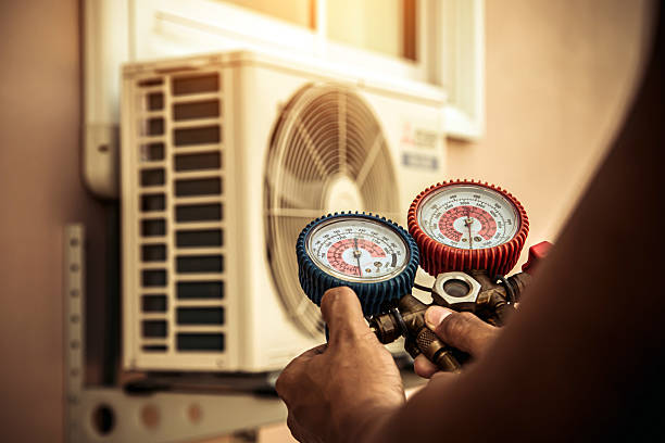 Professional Heat Pump Repair technician working in Fort Loramie, OH